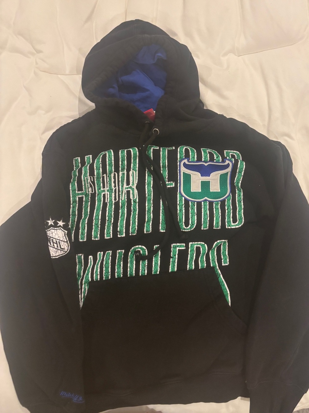 Mitchell & Ness Black Hoodie with Green & Blue Hartford Whalers Logo
